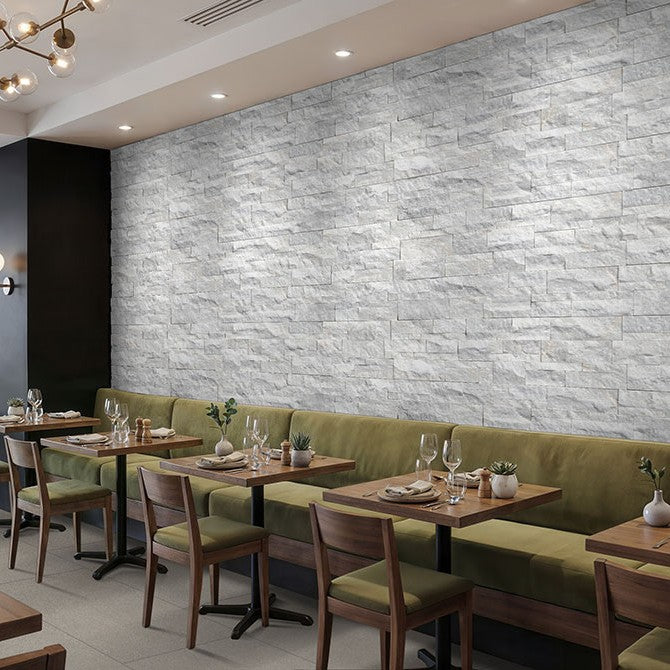 Sierra White Rockmount Stacked Stone Decorative Wall Panels shown installed in a finished outdoor or living space