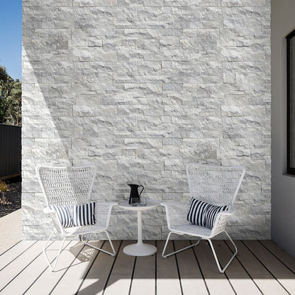 Sierra White Rockmount Stacked Stone Decorative Wall Panels shown installed in a finished outdoor or living space