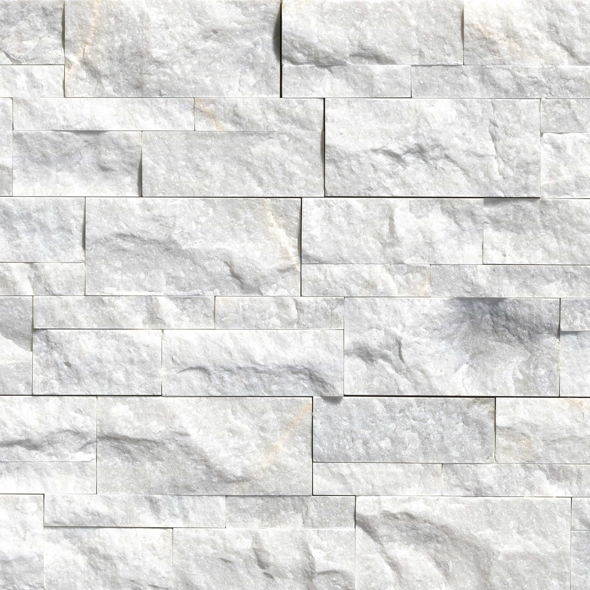 Sierra White stacked stone wall panels, close up product view showing color and texture