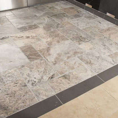 Silver Travertine Tile installed in a room setting
