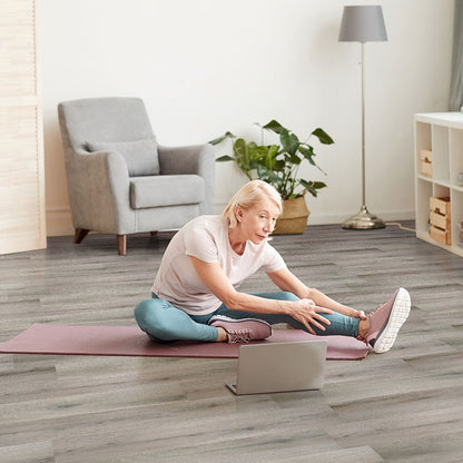 Smithcliffs Avery Ash hybrid rigid core flooring shown in a furnished room