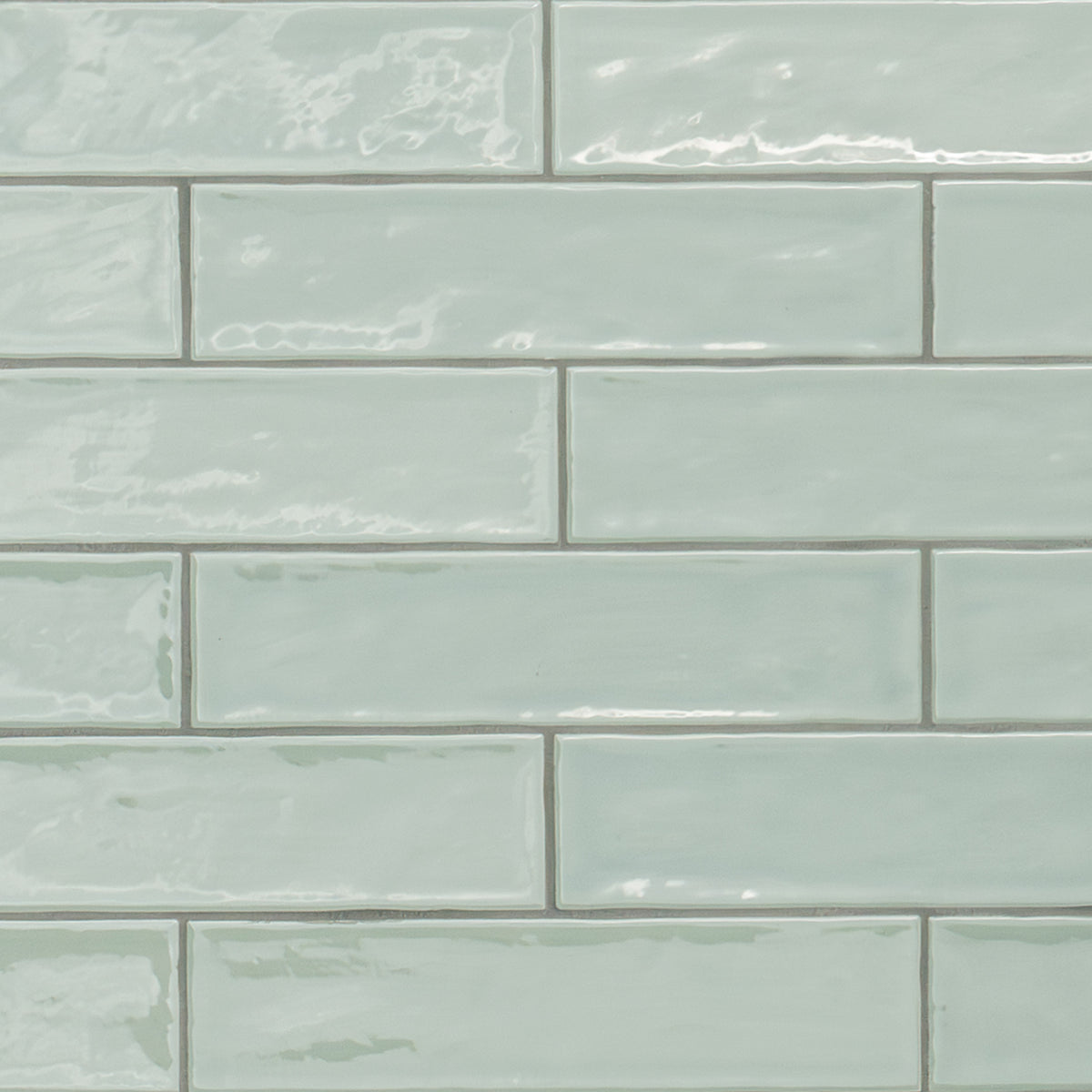 Terranello Olive ceramic tile, glossy finish, 2 by 8 inch view