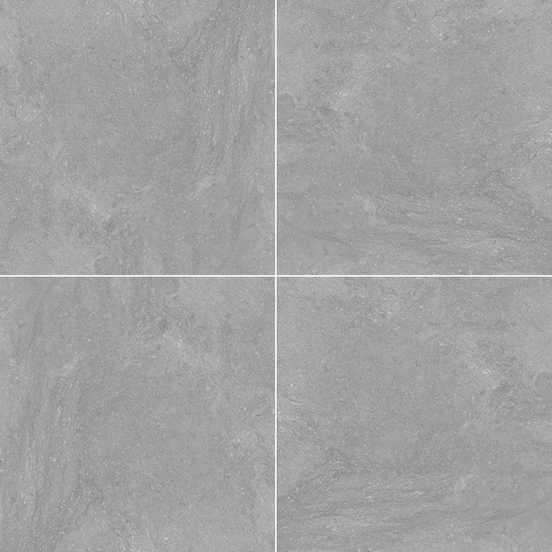 Vulkon Grey porcelain pavers, close up product view showing color and texture
