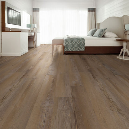 Wilmont Lime Washed Oak glue down luxury vinyl flooring shown in a furnished room