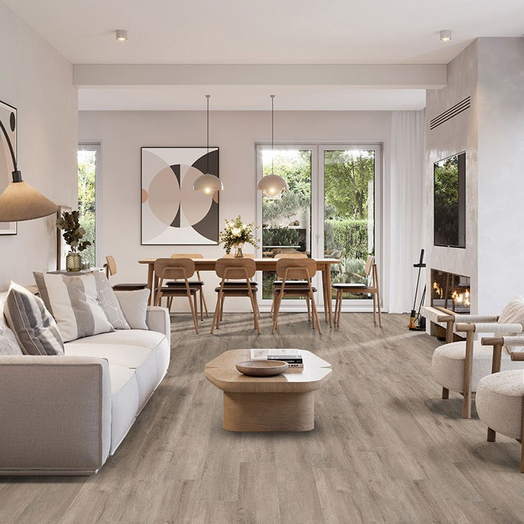 Wilmont Twilight Oak glue down luxury vinyl flooring shown in a furnished room