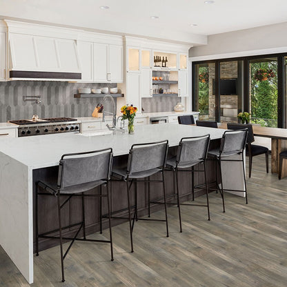 Woodhills Brook Timber Hickory waterproof engineered wood flooring installed in a room