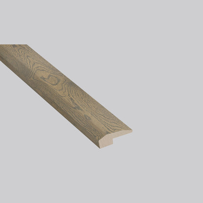 Chestnut Heights Oak end cap trim, matching Woodhills Chestnut Heights Oak waterproof engineered wood