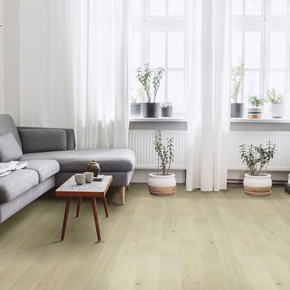 Woodhills Coral Ash Oak waterproof engineered wood flooring installed in a room