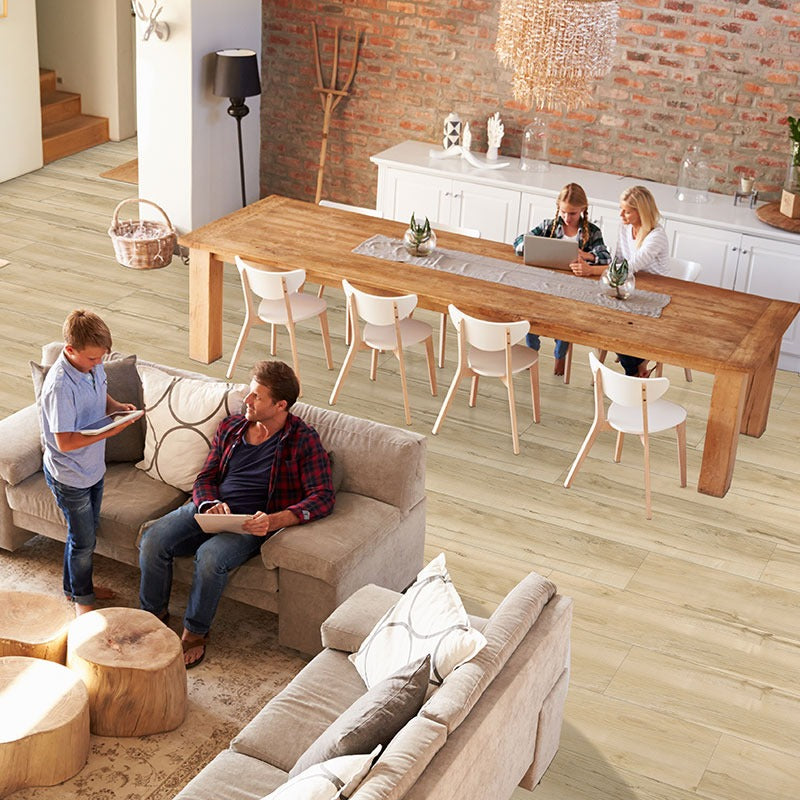 XL Prescott Akadia SPC rigid core vinyl flooring shown in a furnished room