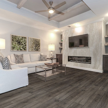 XL Prescott Walnut Waves SPC rigid core vinyl flooring shown in a furnished room