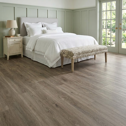 Pacific Oak Western Fir Waterproof Pure SPC™ Max Flooring installed in a bedroom