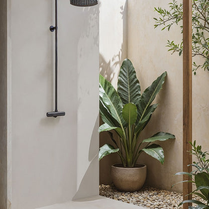 Gris Cemento Matte silica free quartz by Stratus Surfaces on a shower wall