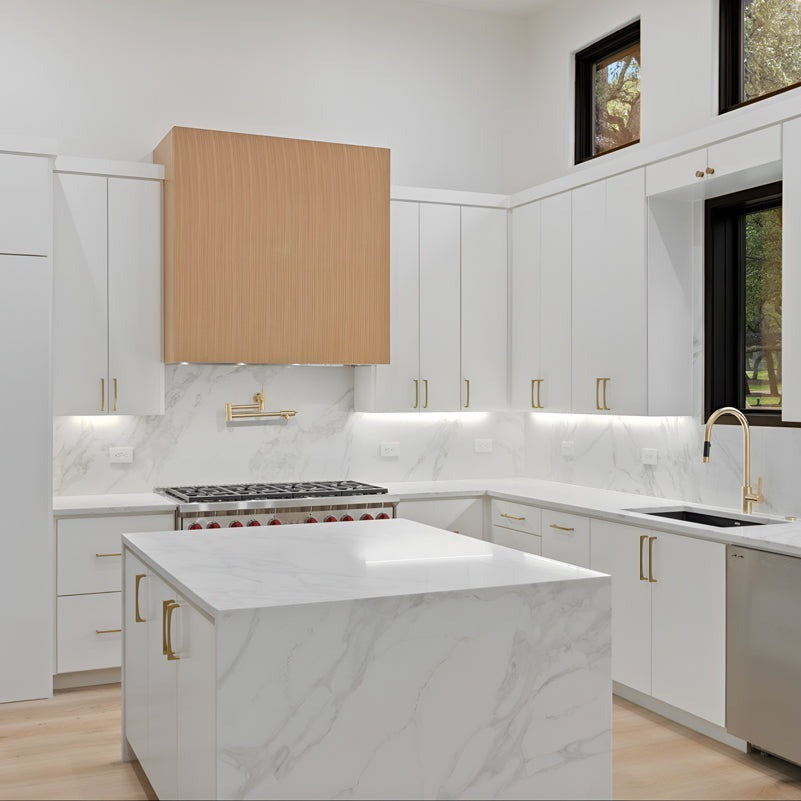 Regal Arabescato Gold silica free quartz countertop by Stratus Surfaces in a finished room