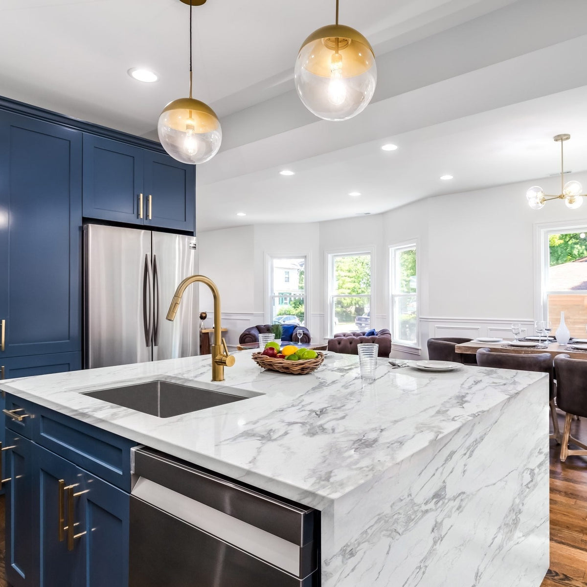 Regal Arabescato silica free quartz countertop by Stratus Surfaces in a finished room