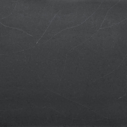 Regal Soapstone Matte silica free quartz slab sample by Stratus Surfaces, deep charcoal black with white and gray veining, matte finish, close up