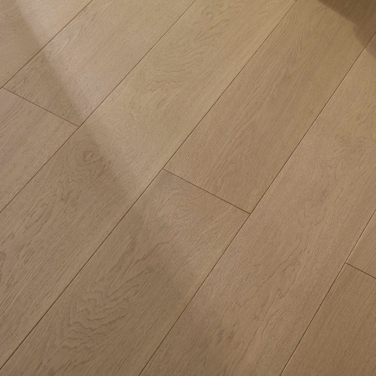 Progettista #126 Engineered Wood Flooring in a warm natural tan, close view of the European oak planks with beveled edges