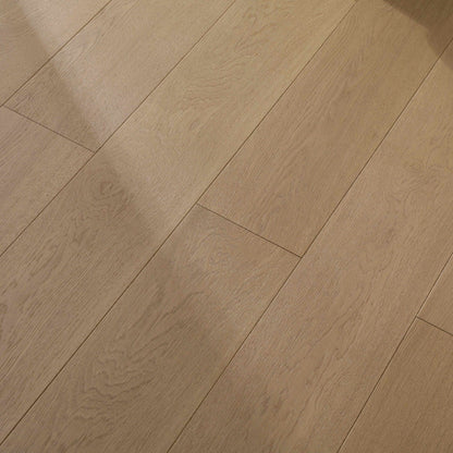 Progettista #126 Engineered Wood Flooring in a warm natural tan, close view of the European oak planks with beveled edges